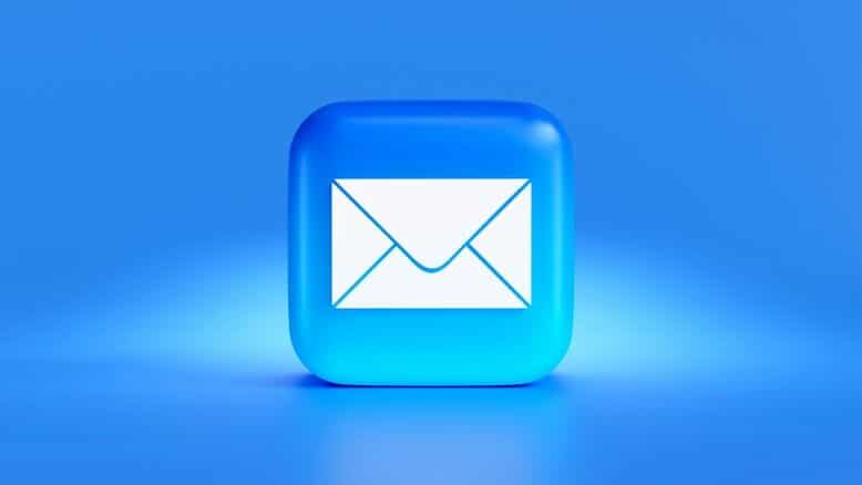 A blue button with a white envelope on it