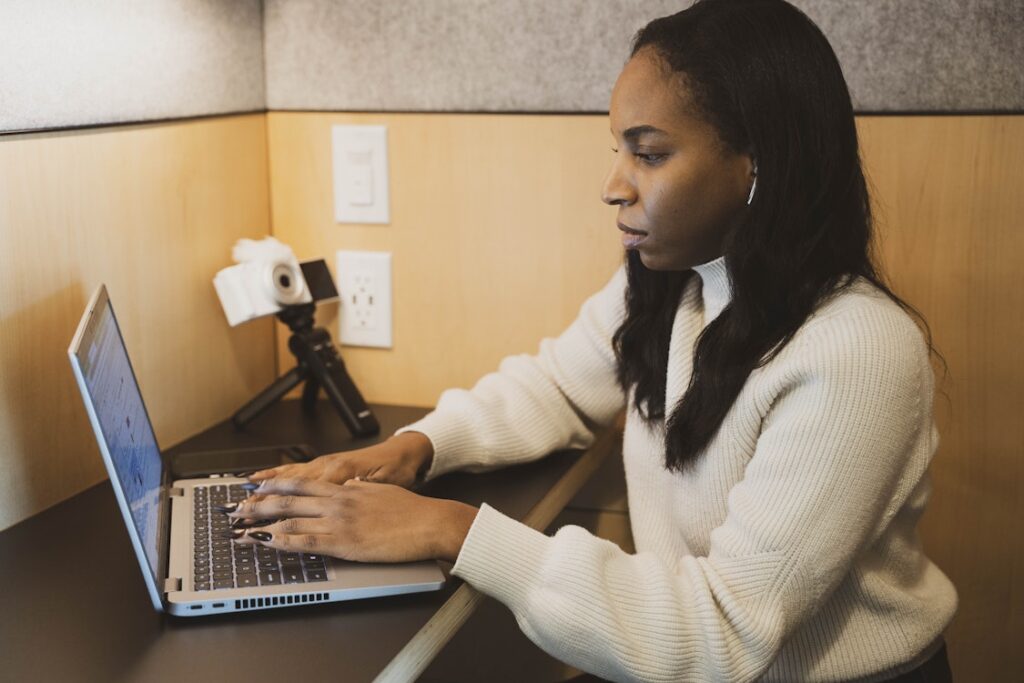 Woman working from home with a laptop