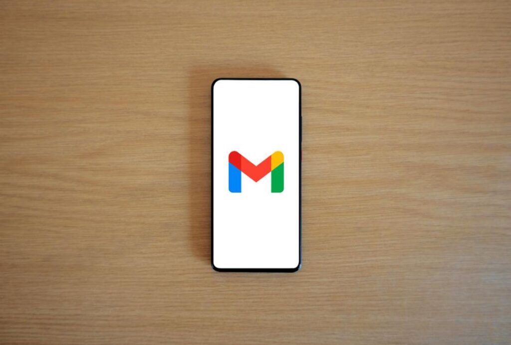 a phone showing the gmail logo