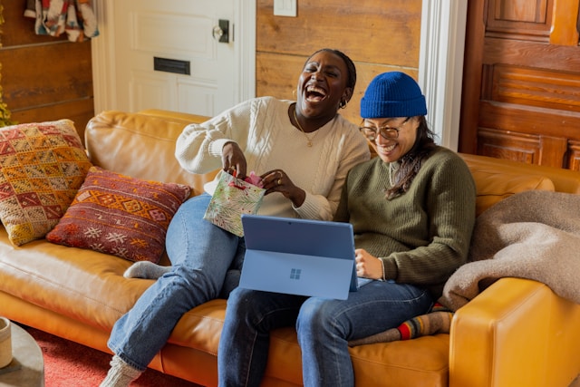 two women laughing 