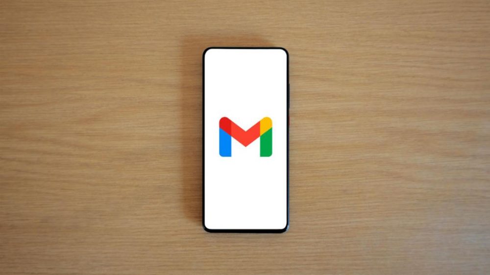 a phone showing the gmail logo